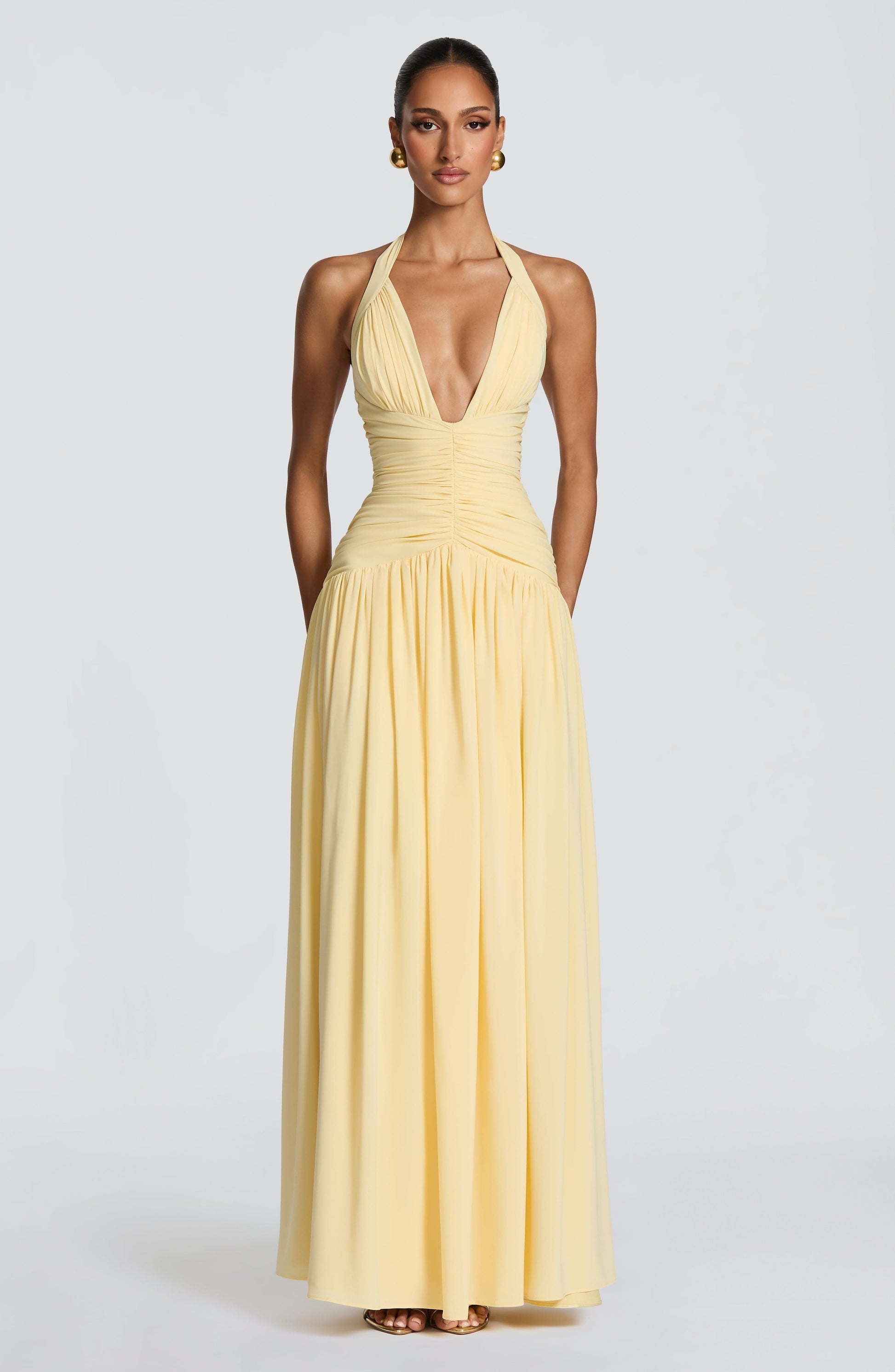 Women's yellow talia halter maxi dress, styled view