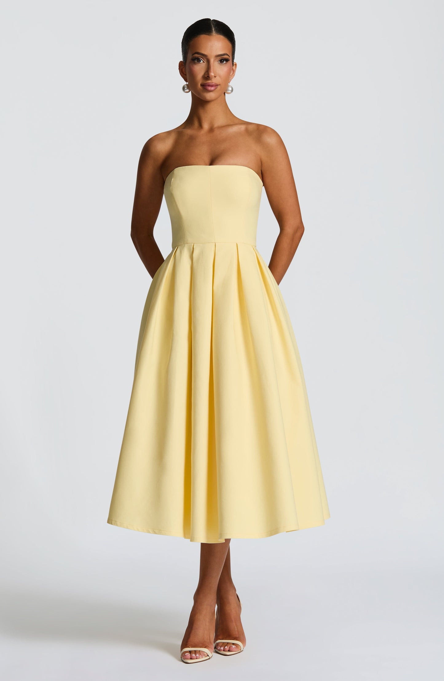 Women's yellow maeve strapless midi dress, styled view