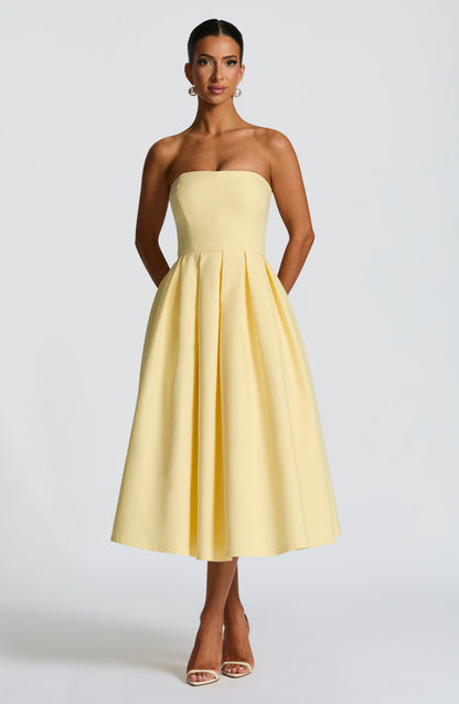 Women's yellow maeve strapless midi dress, styled view