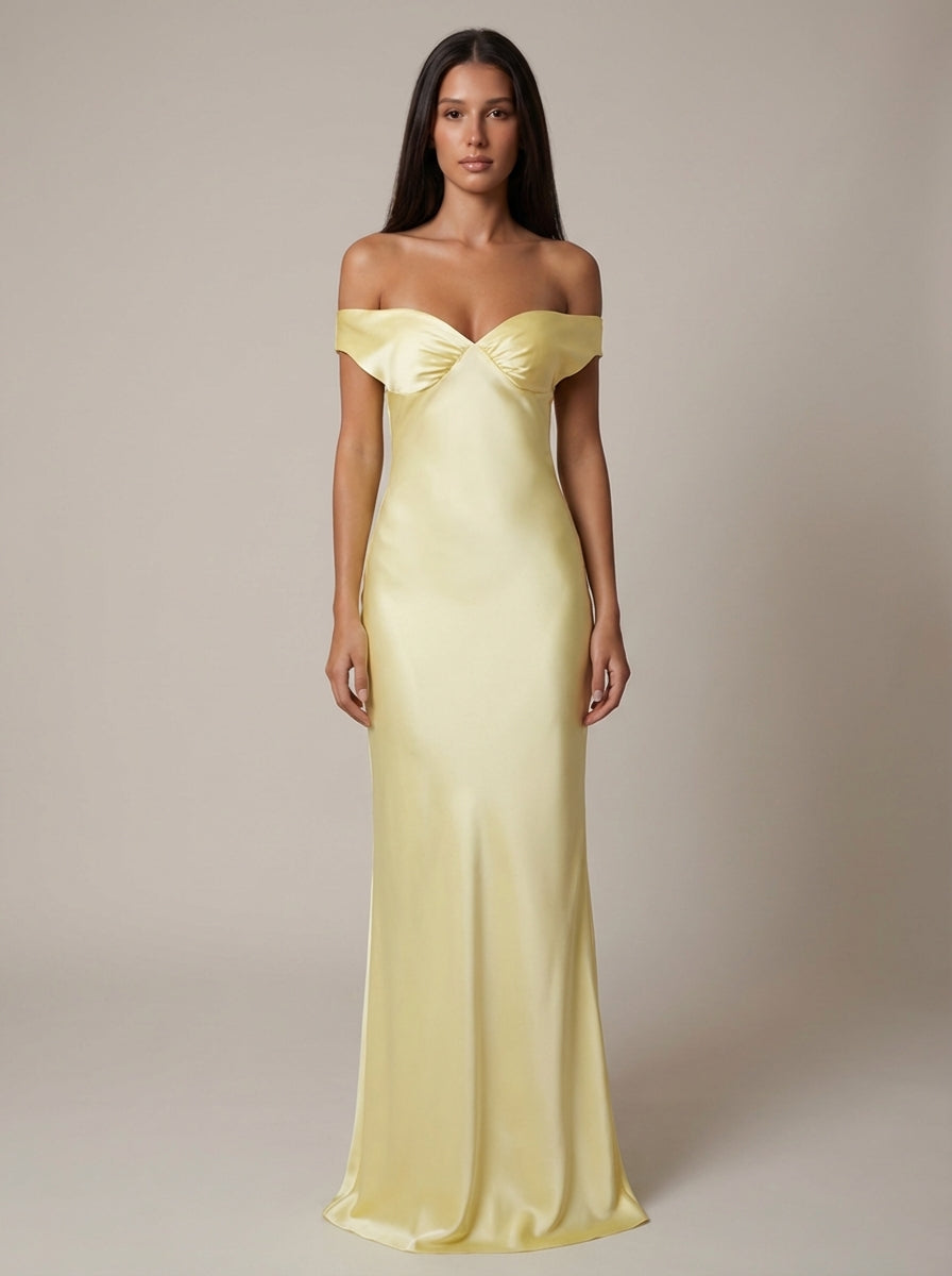 Yellow satin off-shoulder maxi dress with sweetheart neckline and floor-length fitted skirt