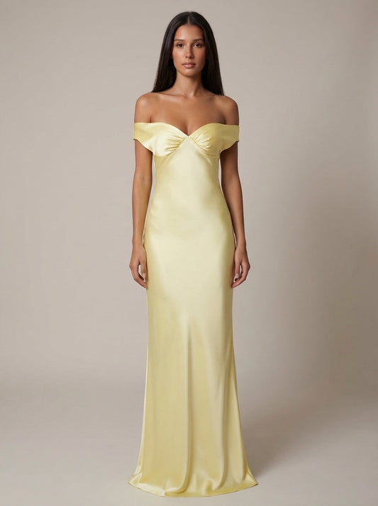 Yellow satin off-shoulder maxi dress with sweetheart neckline and floor-length fitted skirt