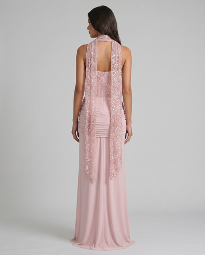 Rear full-length view of pink maxi dress with sequin back bodice, long scarf tails, and flowing hem