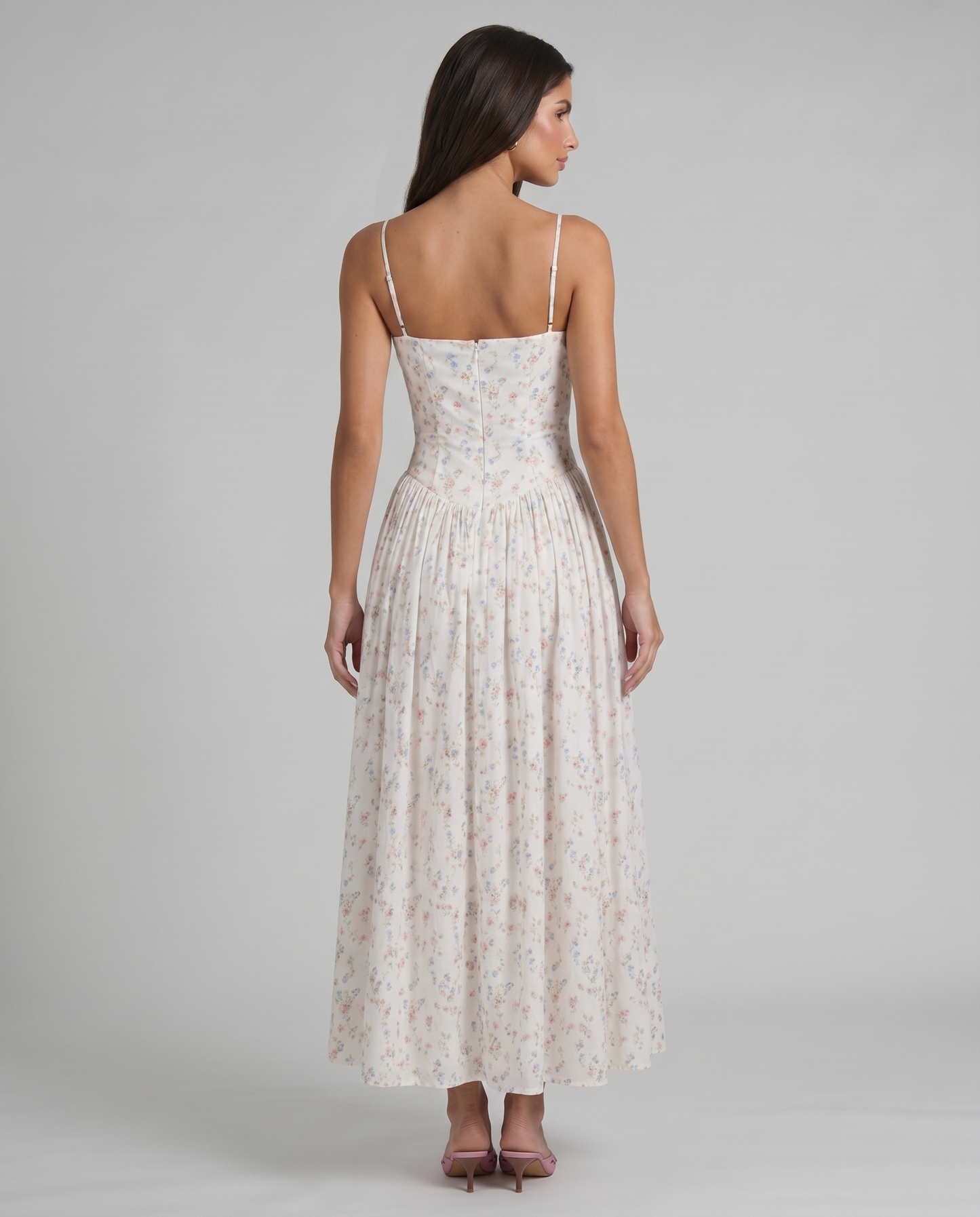 Cream floral midi dress back angle highlighting fitted waist, zip closure and soft drape of skirt