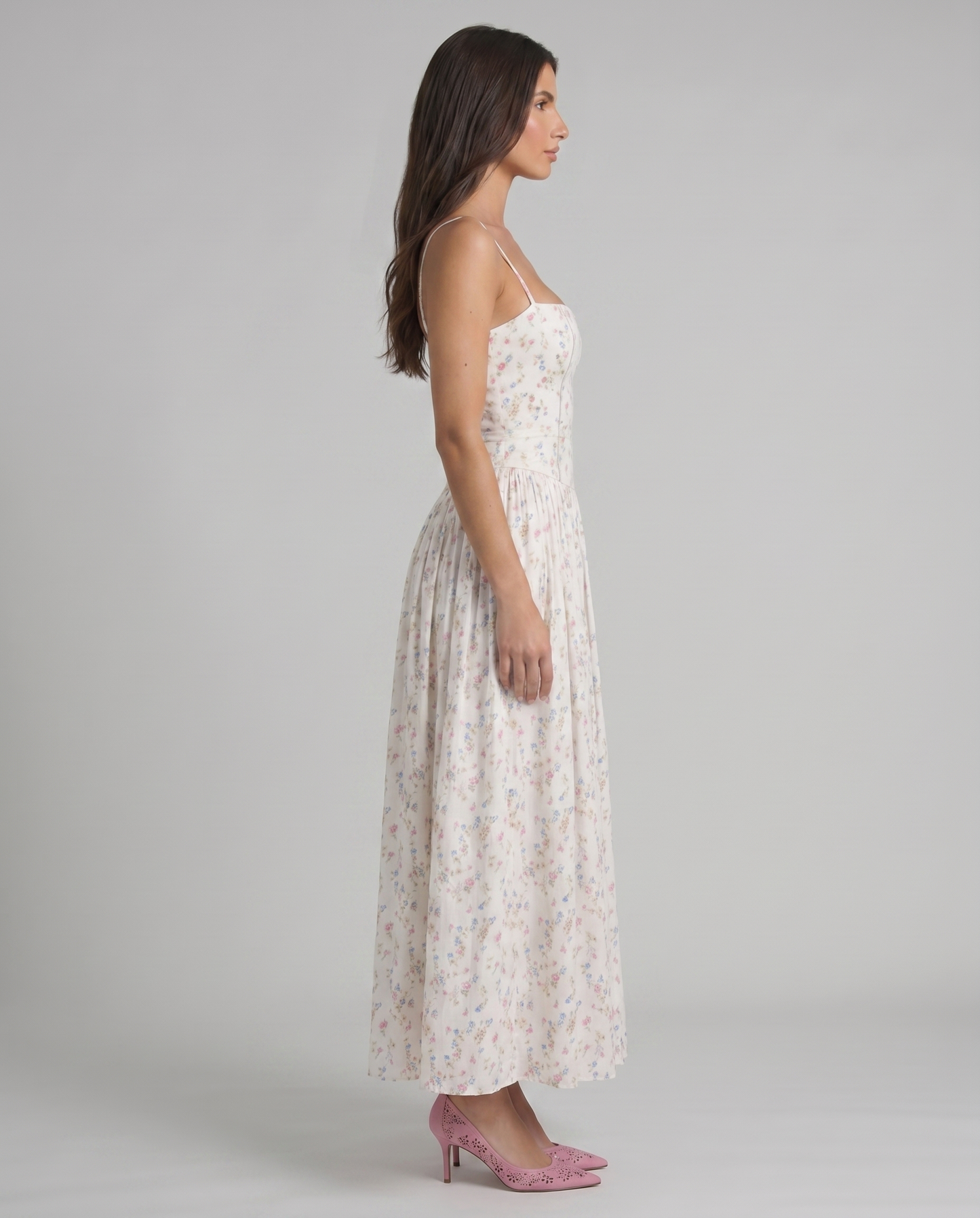 Cream floral midi dress side view with straight neckline and gathered skirt, showing silhouette and drape