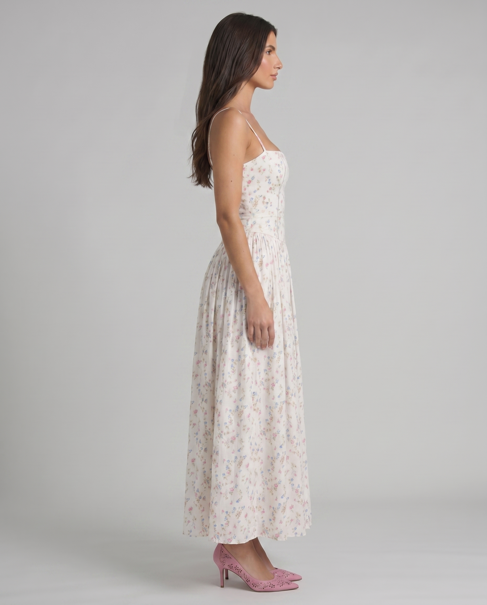 Cream floral midi dress side view with straight neckline and gathered skirt, showing silhouette and drape