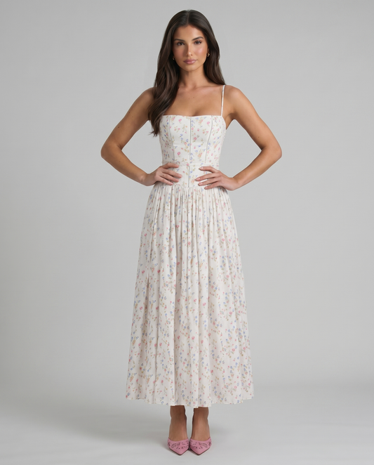 Cream floral midi dress with spaghetti straps, fitted bodice seams and gathered skirt, front view