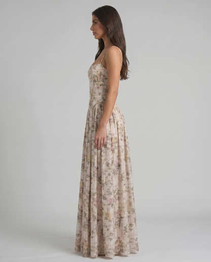 Rear close-up of green floral midi dress with back zipper closure, slim straps and fitted bodice