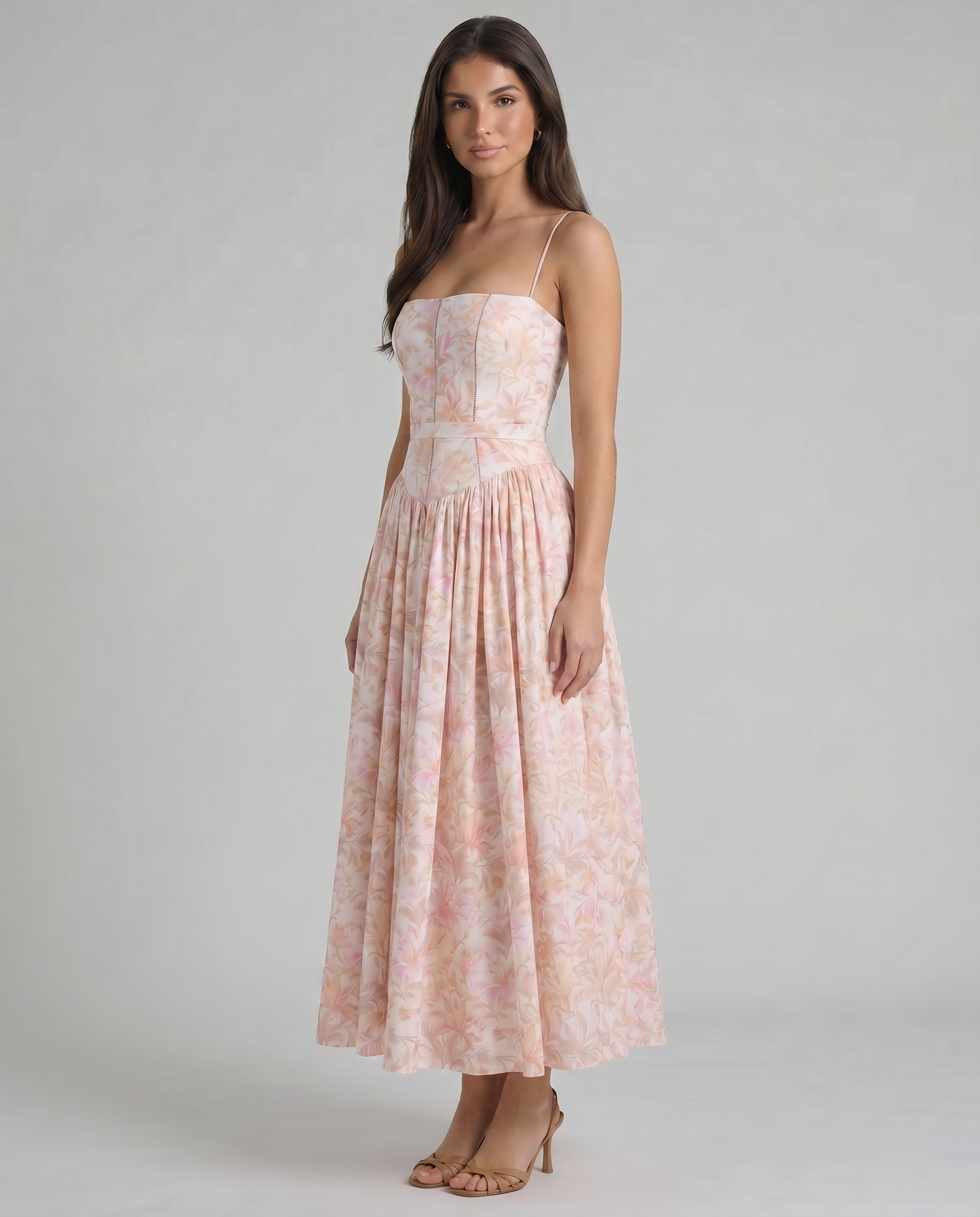 Angled front view peach floral midi dress highlighting gathered skirt volume and waist seam