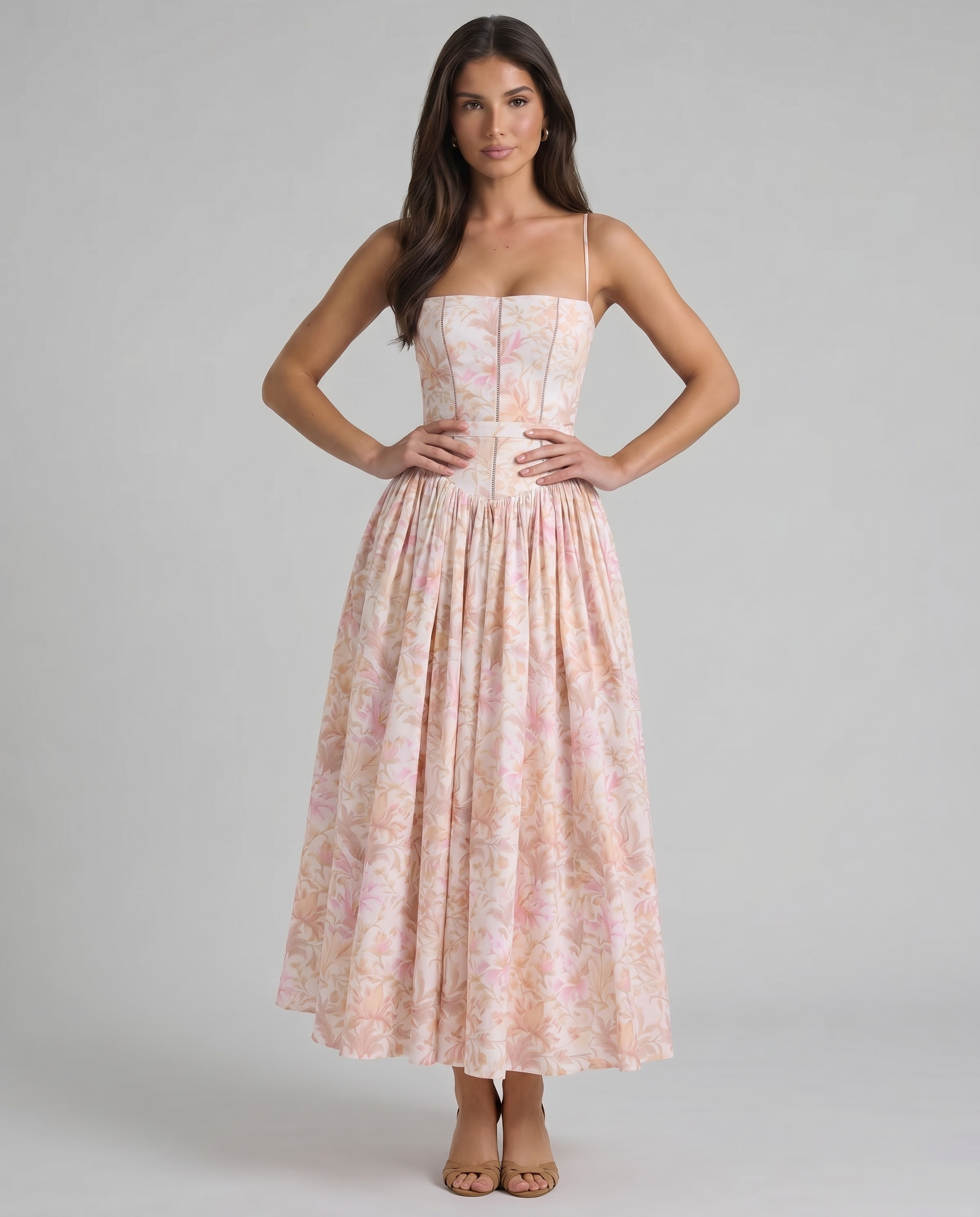 Peach floral midi dress with corset-style bodice, spaghetti straps, and full gathered skirt