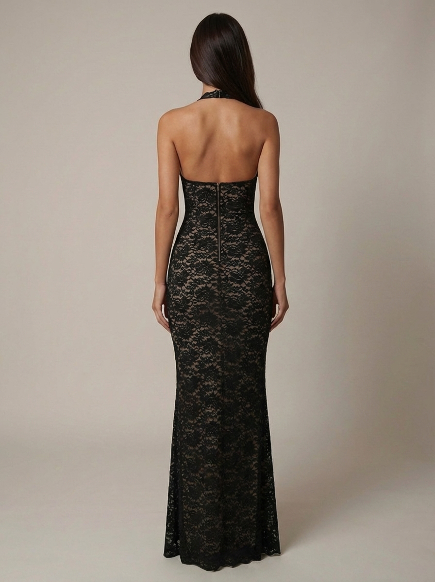 Rear angle of black lace maxi dress highlighting fitted waist, sheer lace pattern and straight floor-length skirt