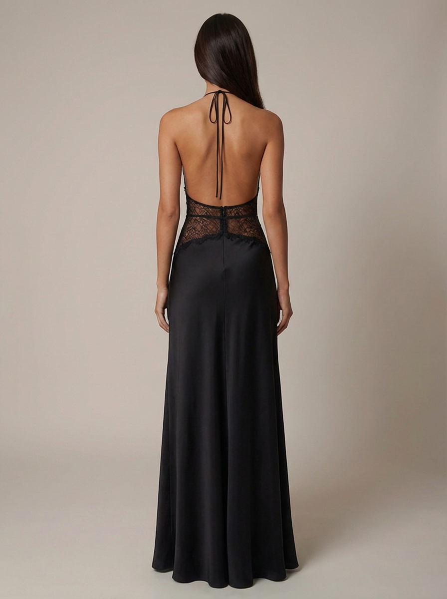 Back view of black halter maxi dress with open back tie straps, lace waistband, and long skirt