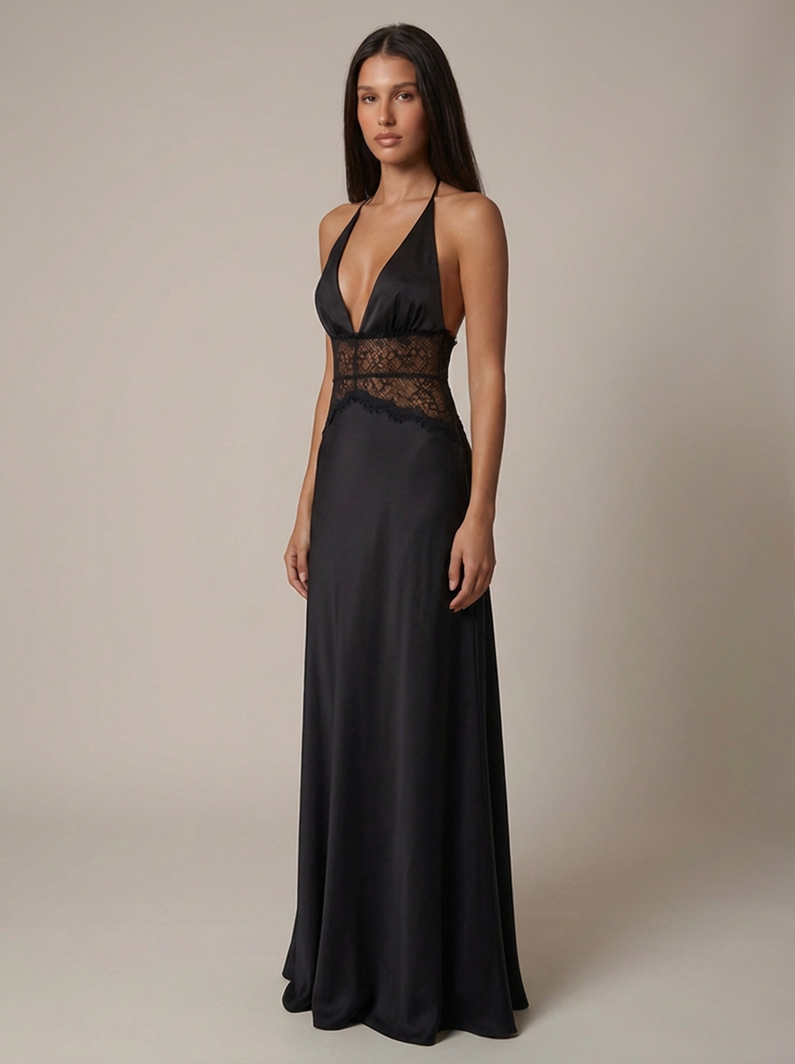 Three-quarter front view of black satin maxi dress with plunge halter neck and sheer lace waist detail