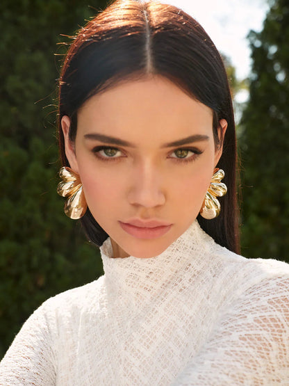 Women gold statement earrings with clustered molten petal shapes