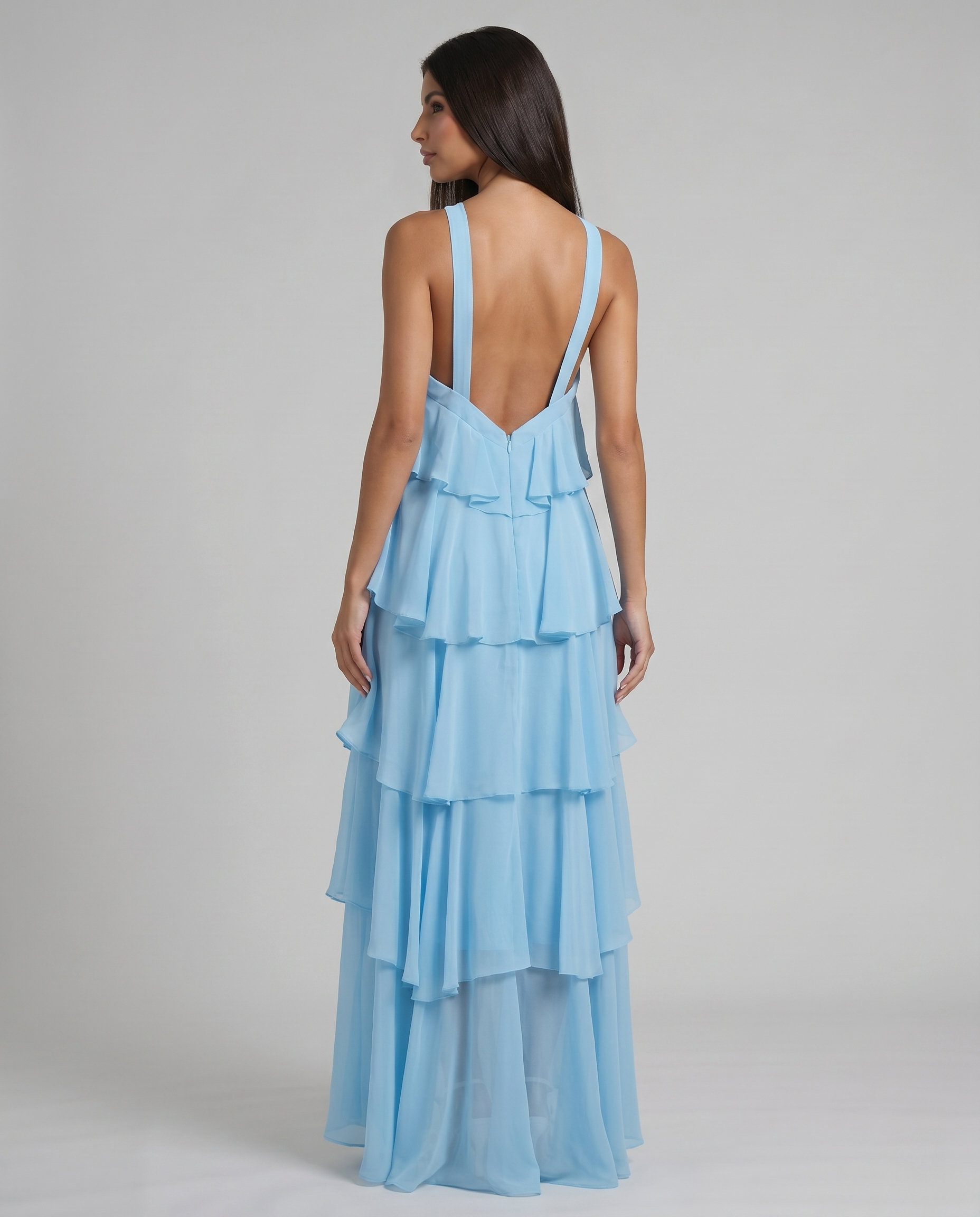 Blue ruffle maxi dress from the back with open V-back straps and soft chiffon tiers