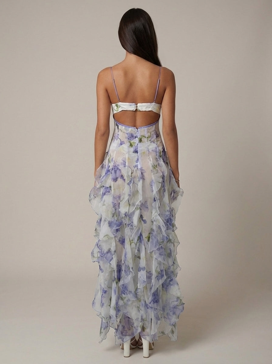 Blue floral maxi dress with corset-style bodice and cascading ruffle skirt for women, angled view