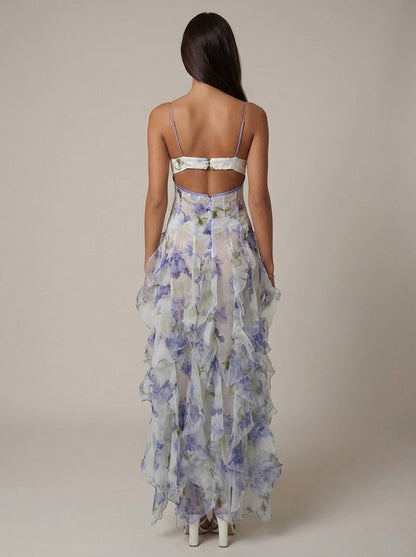 Blue floral maxi dress with corset-style bodice and cascading ruffle skirt for women, angled view