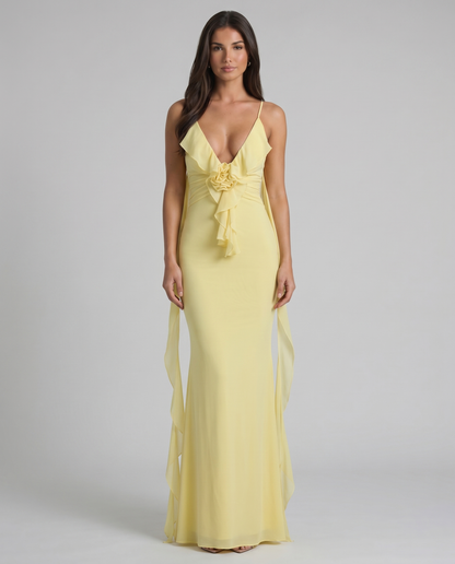 Yellow maxi dress with deep V neckline, spaghetti straps, rosette ruffle detail and floor-length skirt