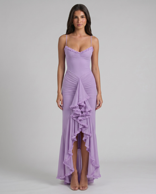 Purple maxi dress with sweetheart neckline, spaghetti straps, ruched hips, and ruffle front cascade