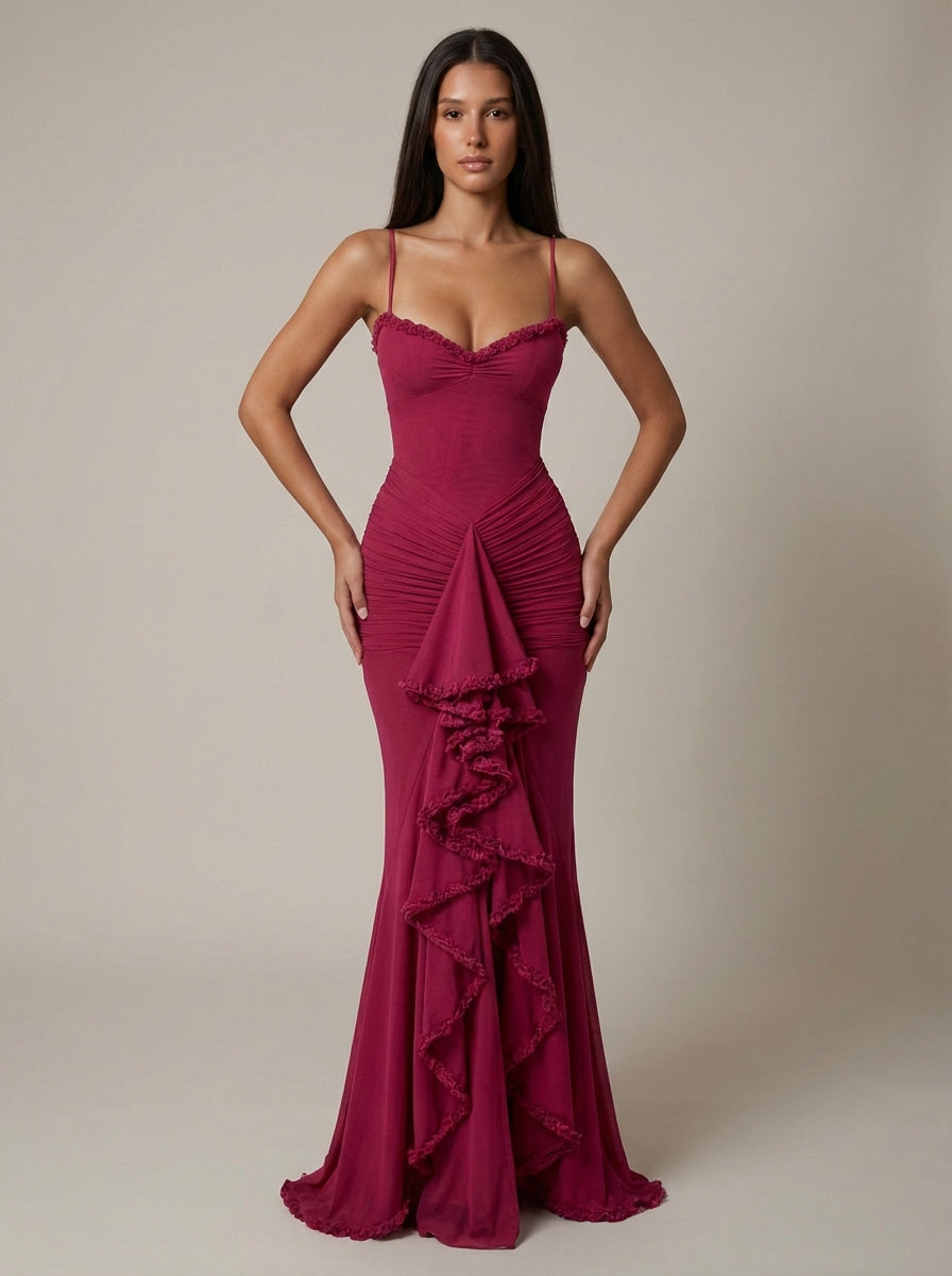Front view deep red evening maxi dress with lace-trim bust, gathered waist ruching, and cascading ruffle trim