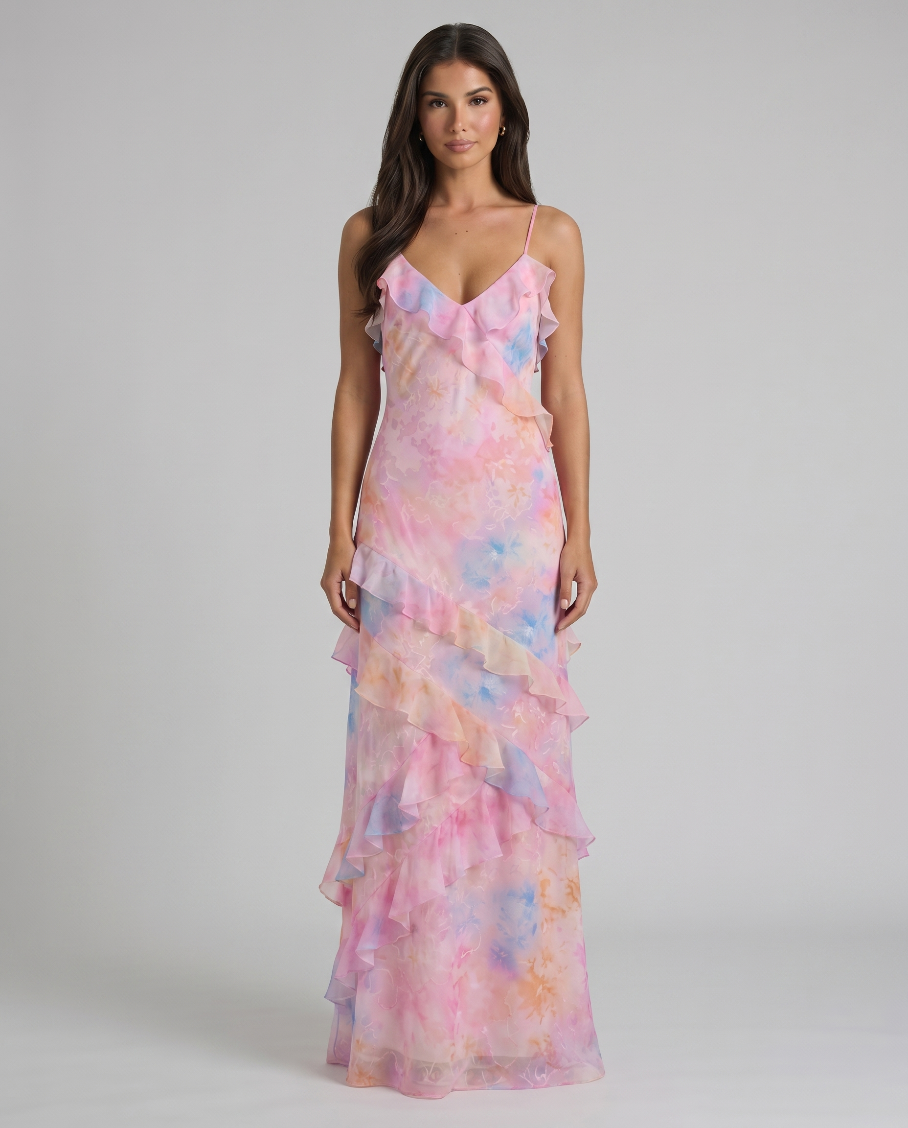 Front view of pink tie-dye maxi dress with layered ruffle trim and cascading skirt detail