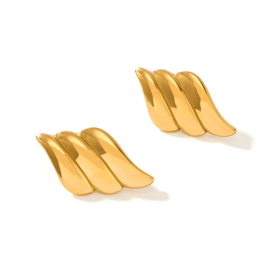 Women gold layered band earrings curved into a dome shape