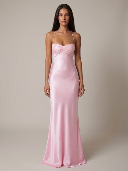Full-length pink maxi dress in shiny satin, fitted silhouette with beaded bust panel