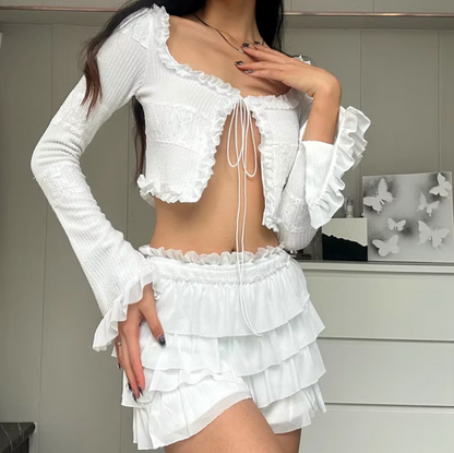 Women white two piece set with tie front crop top and tiered ruffle shorts