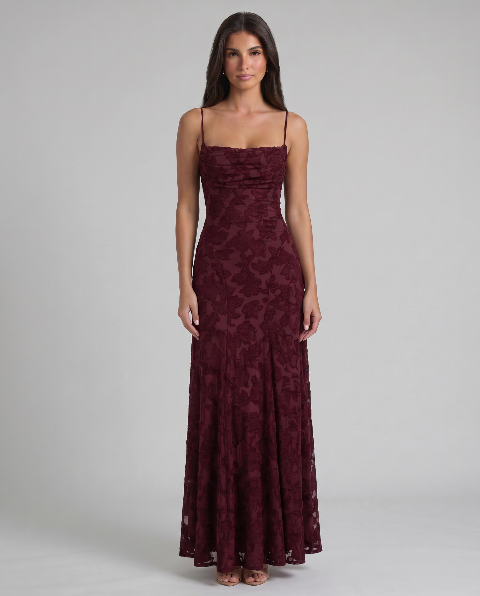 Full-length side view burgundy floral maxi dress showing smooth fit through hips and flowy skirt