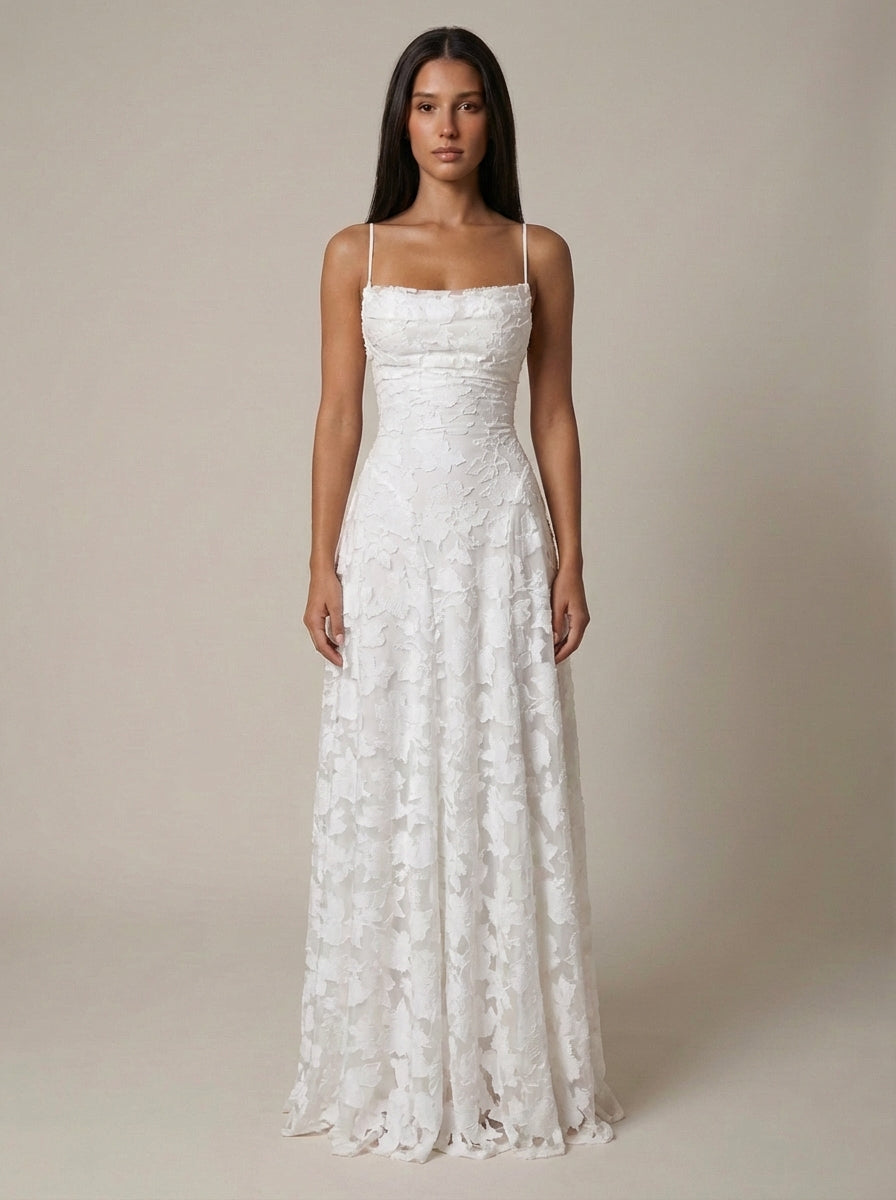 White floral lace maxi dress with spaghetti straps and straight neckline, full-length front view