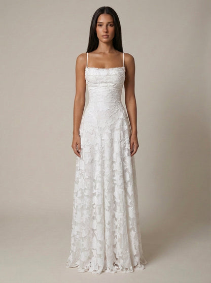 White floral lace maxi dress with spaghetti straps and straight neckline, full-length front view