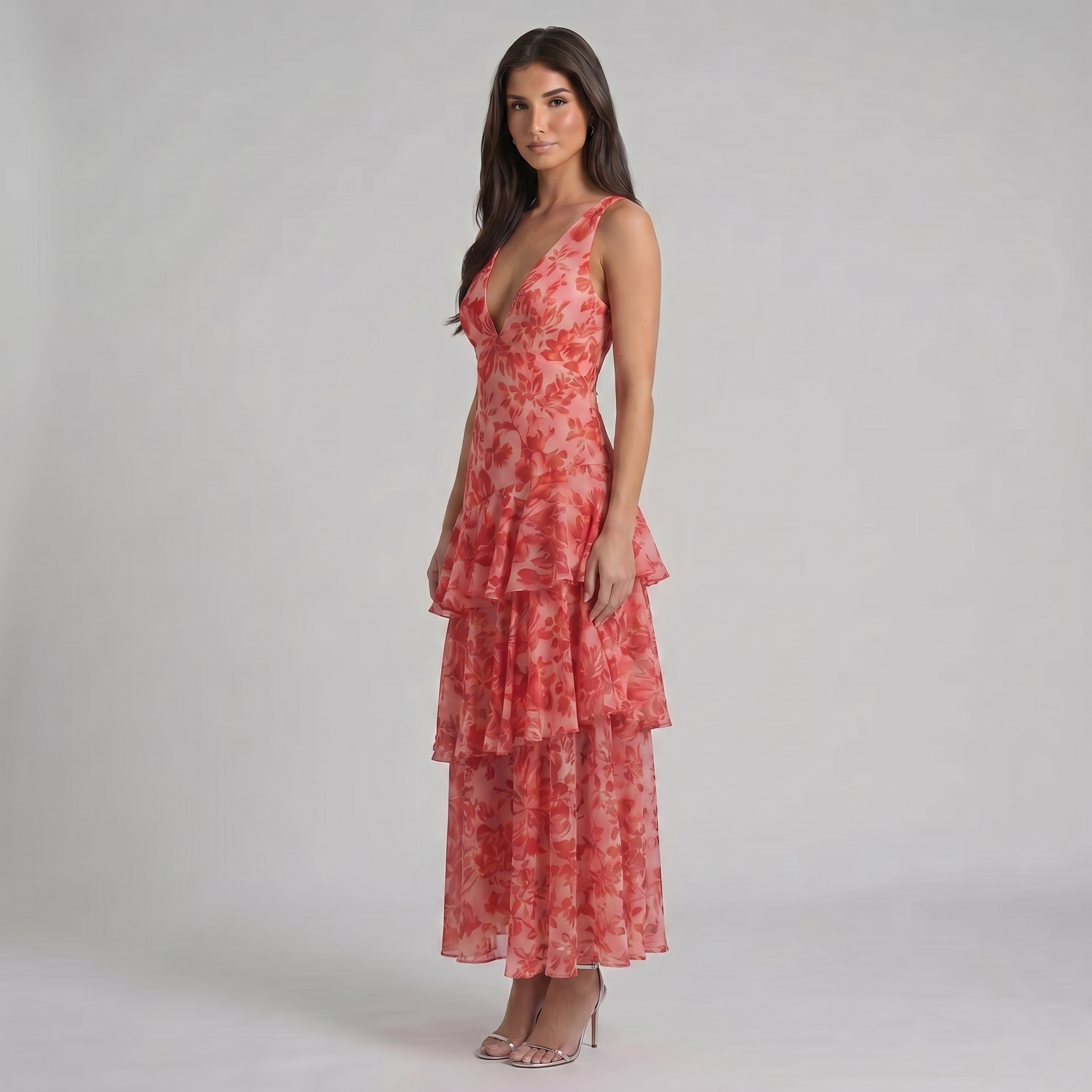 Angled front view red floral maxi dress with fitted silhouette and airy chiffon tiers