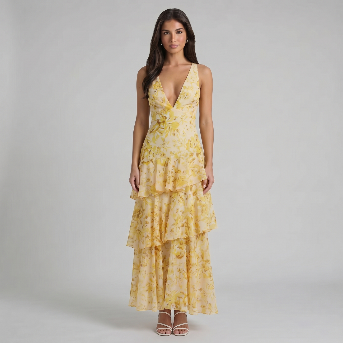 Yellow floral maxi dress with deep V-neck and tiered ruffle skirt, front full-length view