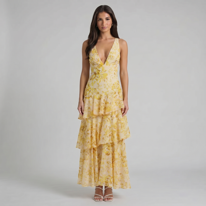 Yellow floral maxi dress with deep V-neck and tiered ruffle skirt, front full-length view