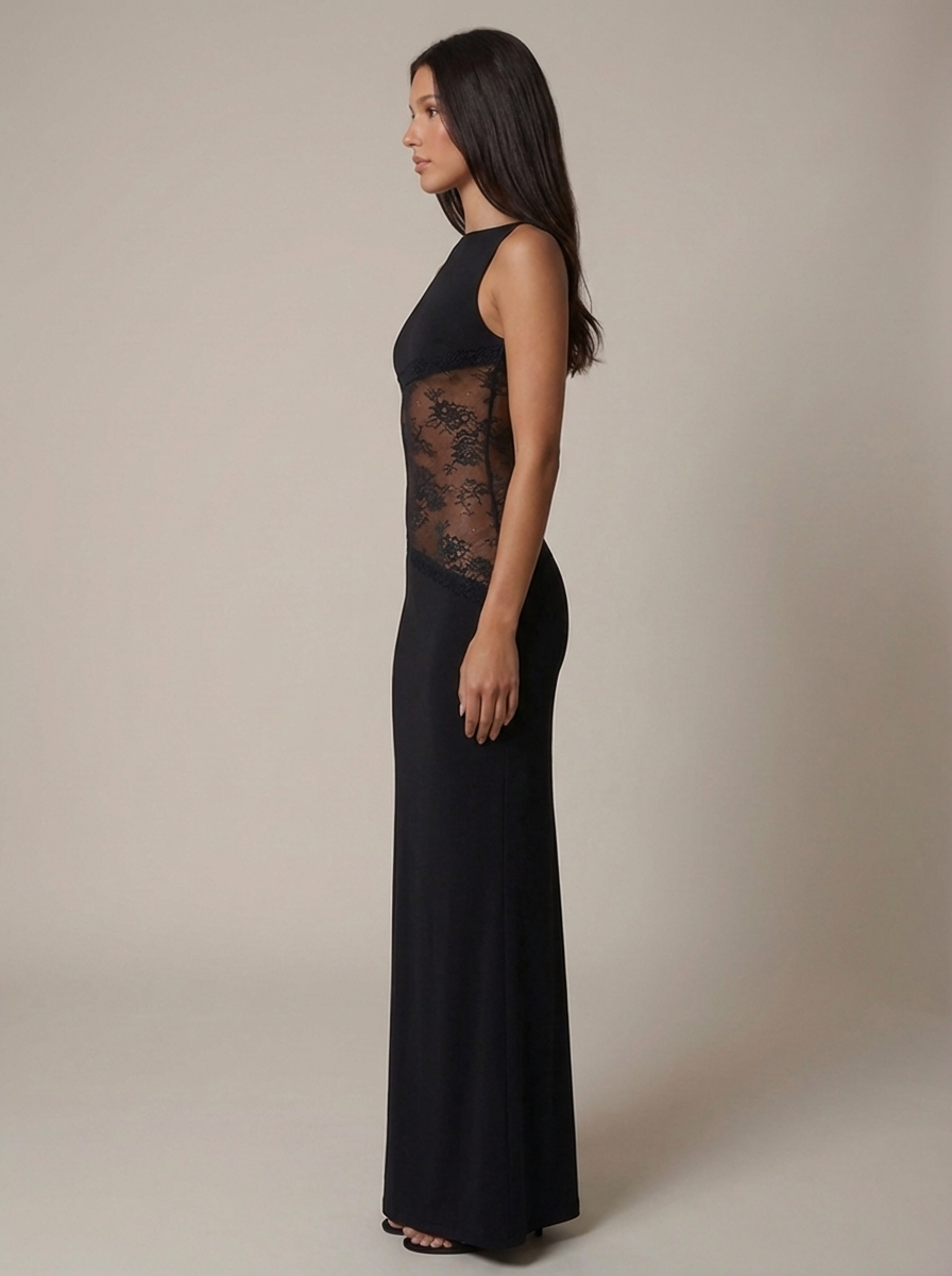 Side view black maxi dress highlighting smooth skirt drape and sheer floral lace waist detail