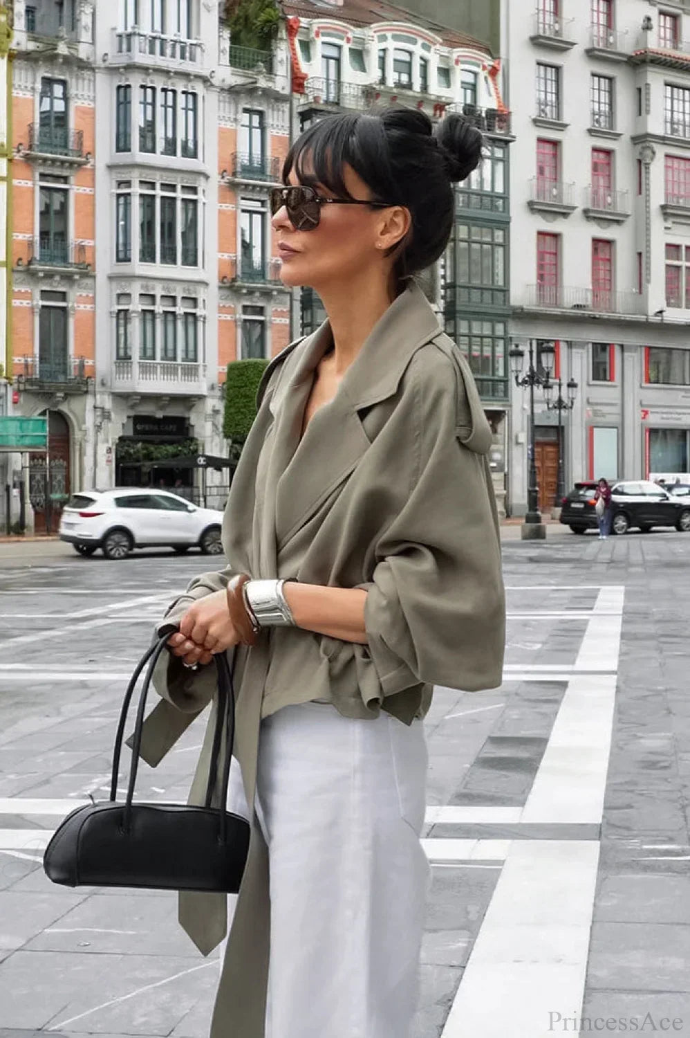 Women green wrap jacket with notch lapel, epaulettes and tie belt