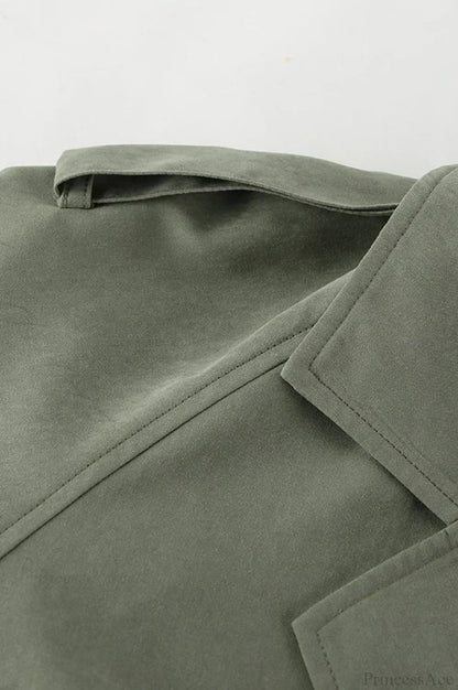 Women green wrap jacket with notch lapel, epaulettes and tie belt