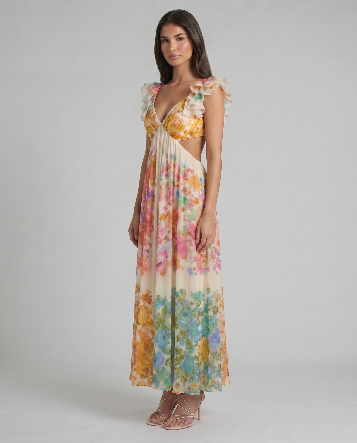 Angled view of multicolor floral midi dress with side cutout waist and ruffled shoulders