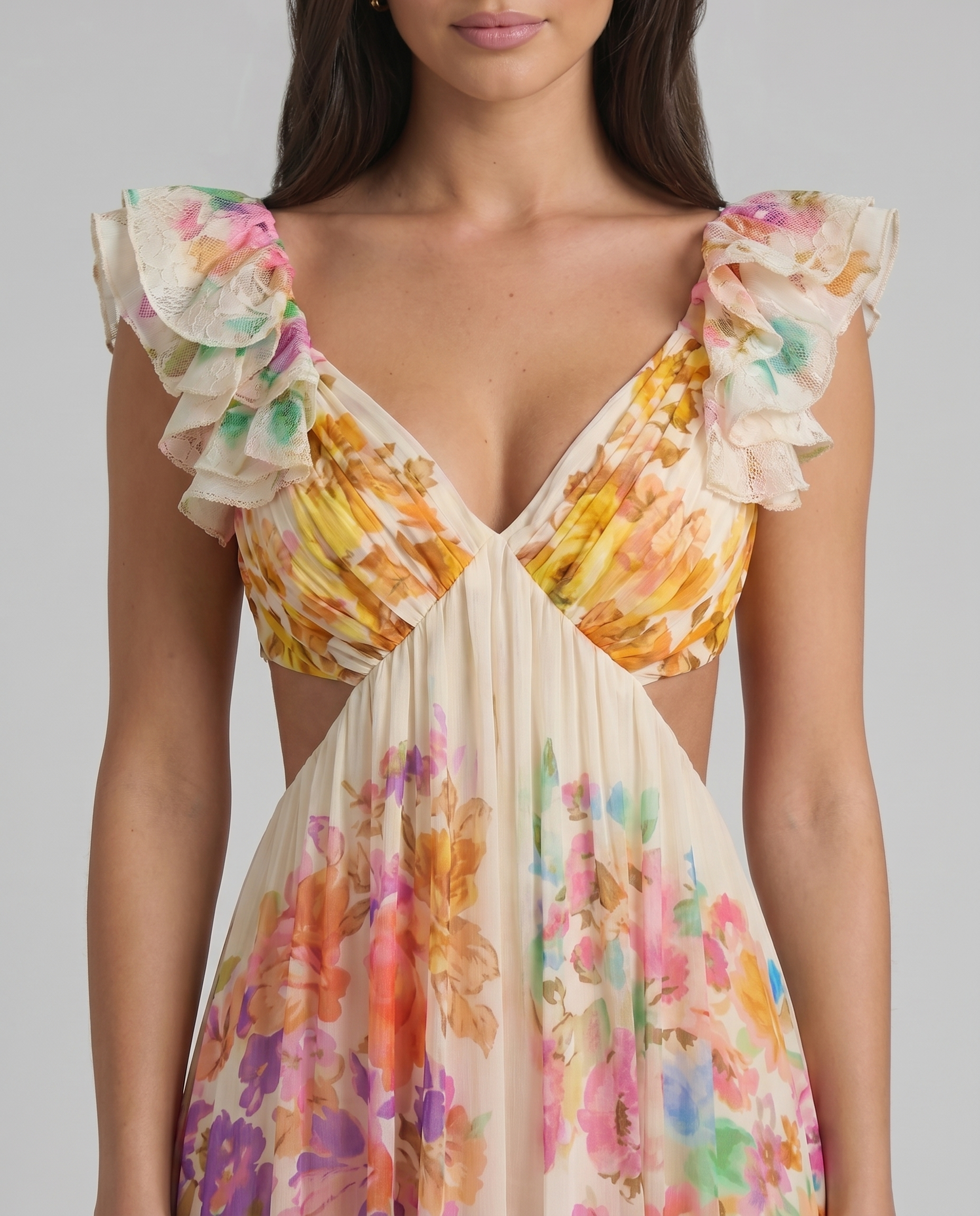 Close-up of V-neck bodice on multicolor floral midi dress with layered ruffle sleeves and pleats