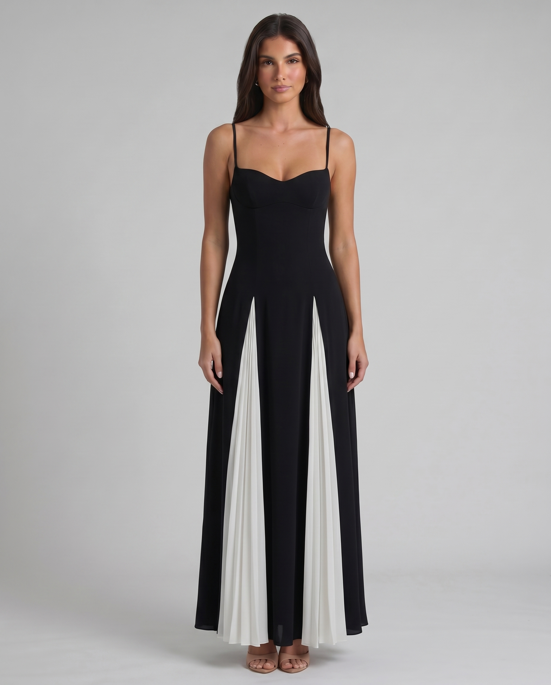 White and black romantic maxi dress with sweetheart neckline and pleated white panel skirt, front view