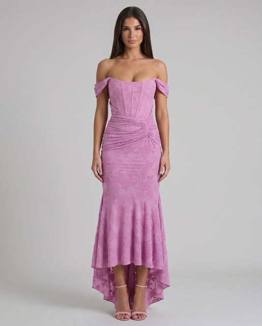 Front view of pink corset maxi dress with off-shoulder sleeves, ruched waist and high-low hem