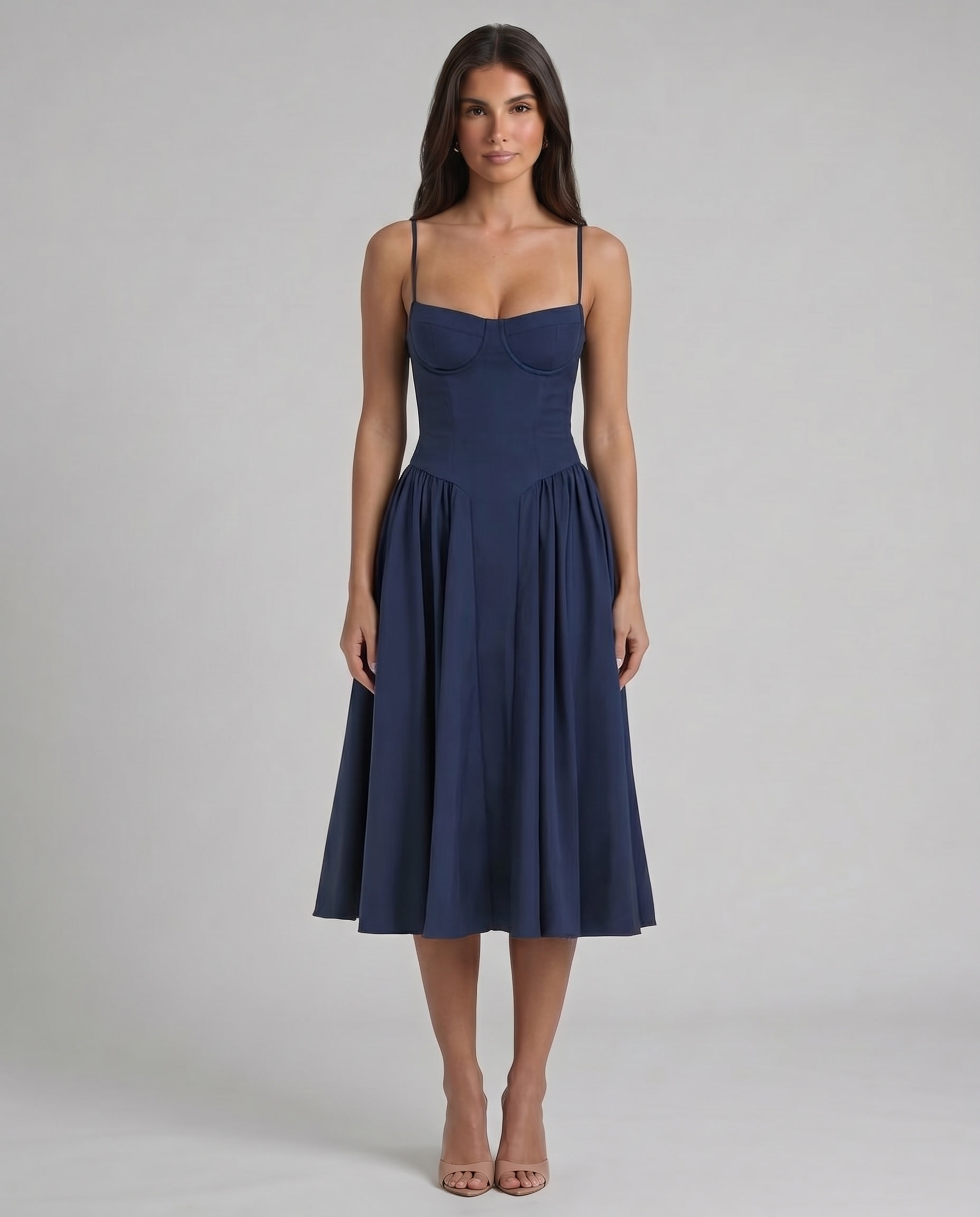 Blue fit-and-flare midi dress front view with structured cups, fitted waist and softly gathered skirt
