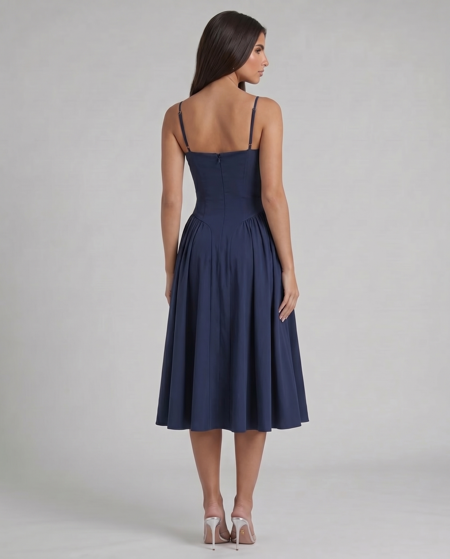 Blue midi dress back full-length view with straight back neckline, adjustable straps and flared skirt