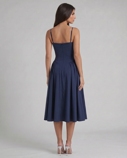 Blue midi dress back full-length view with straight back neckline, adjustable straps and flared skirt