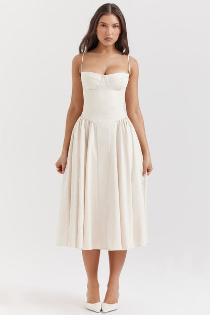 Front view of white midi dress with corset-inspired bodice and gathered A-line skirt, mid-calf length