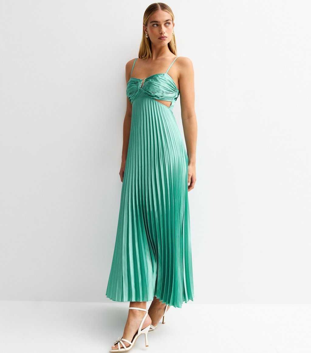Front view of aqua blue plisse midi dress with side waist cutouts and pleated skirt