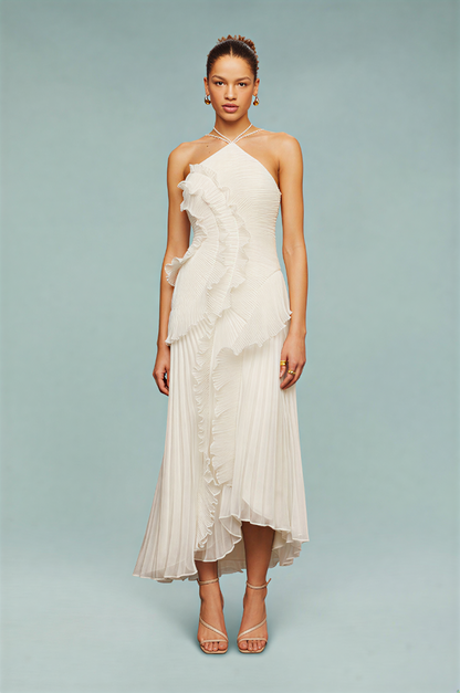 White maxi dress with halter neckline, cascading ruffle front and pleated chiffon skirt, full length