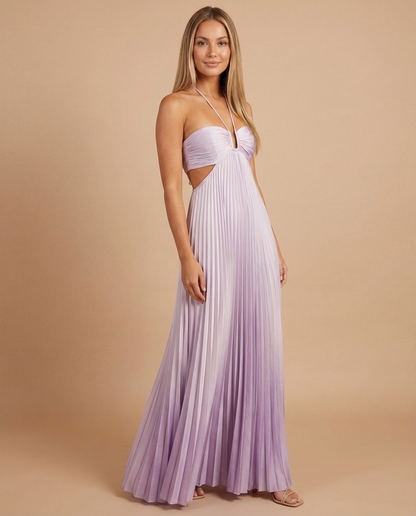 Soft pink pleated maxi dress with halter strap, ruched bust and side cutouts, angled front view