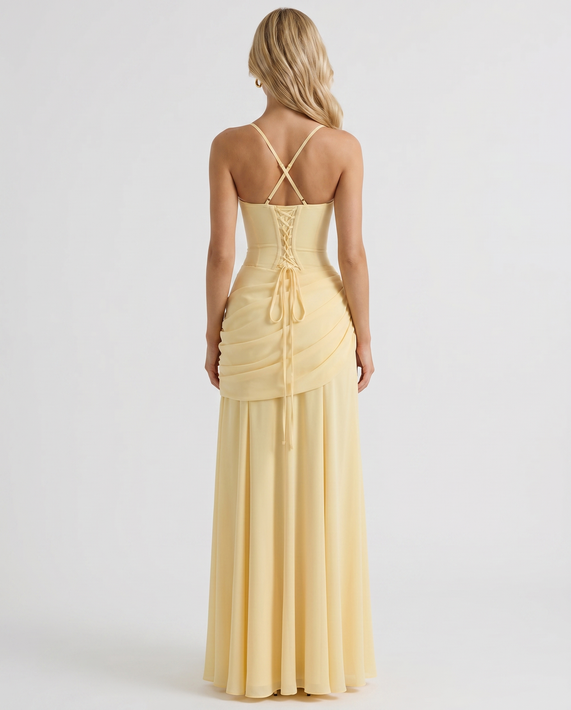 Women yellow ruched maxi dress with fitted back bodice and flowing maxi skirt, back view
